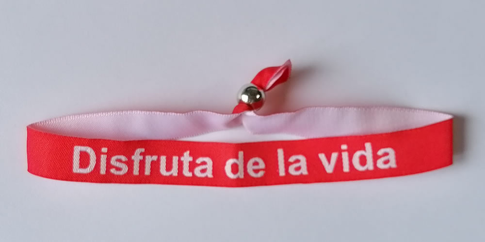 Pulsera roja Disfruta de la Vida